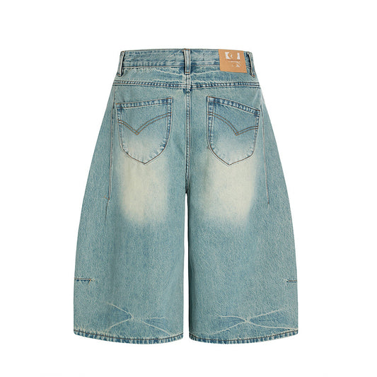 Three Dimensional Cutting Washed Curved Knife Denim Shorts