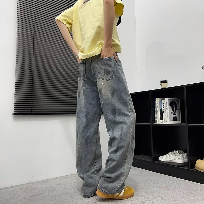 Washed and Distressed Splashed Ink Denim Jeans for Men