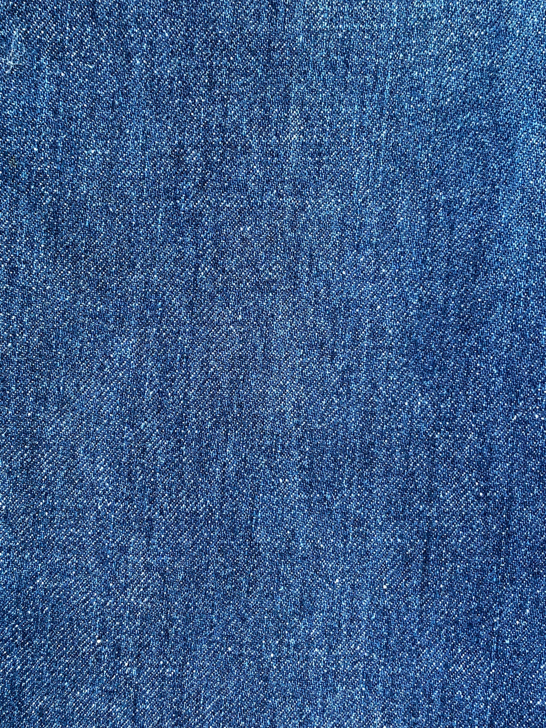 a close up of a blue jean fabric