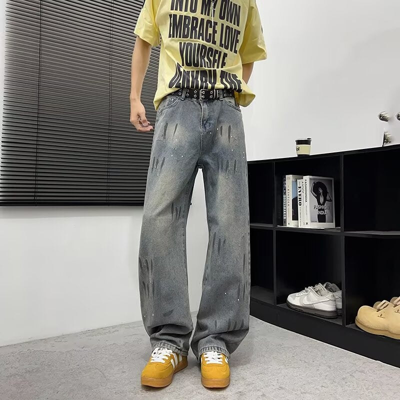 Washed and Distressed Splashed Ink Denim Jeans for Men