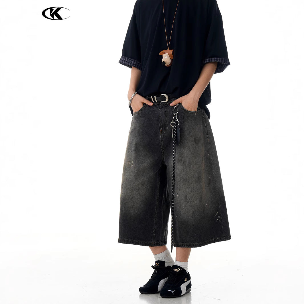 Seven-Quarter Denim Shorts with Faded Ink Splatter -  Wide-Leg Fit