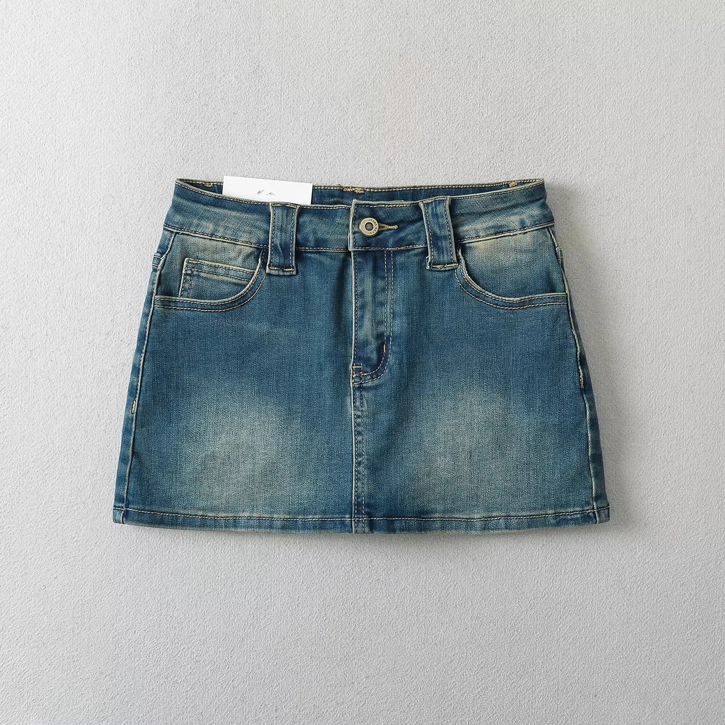Washed and Ground White Denim Mini Skirt