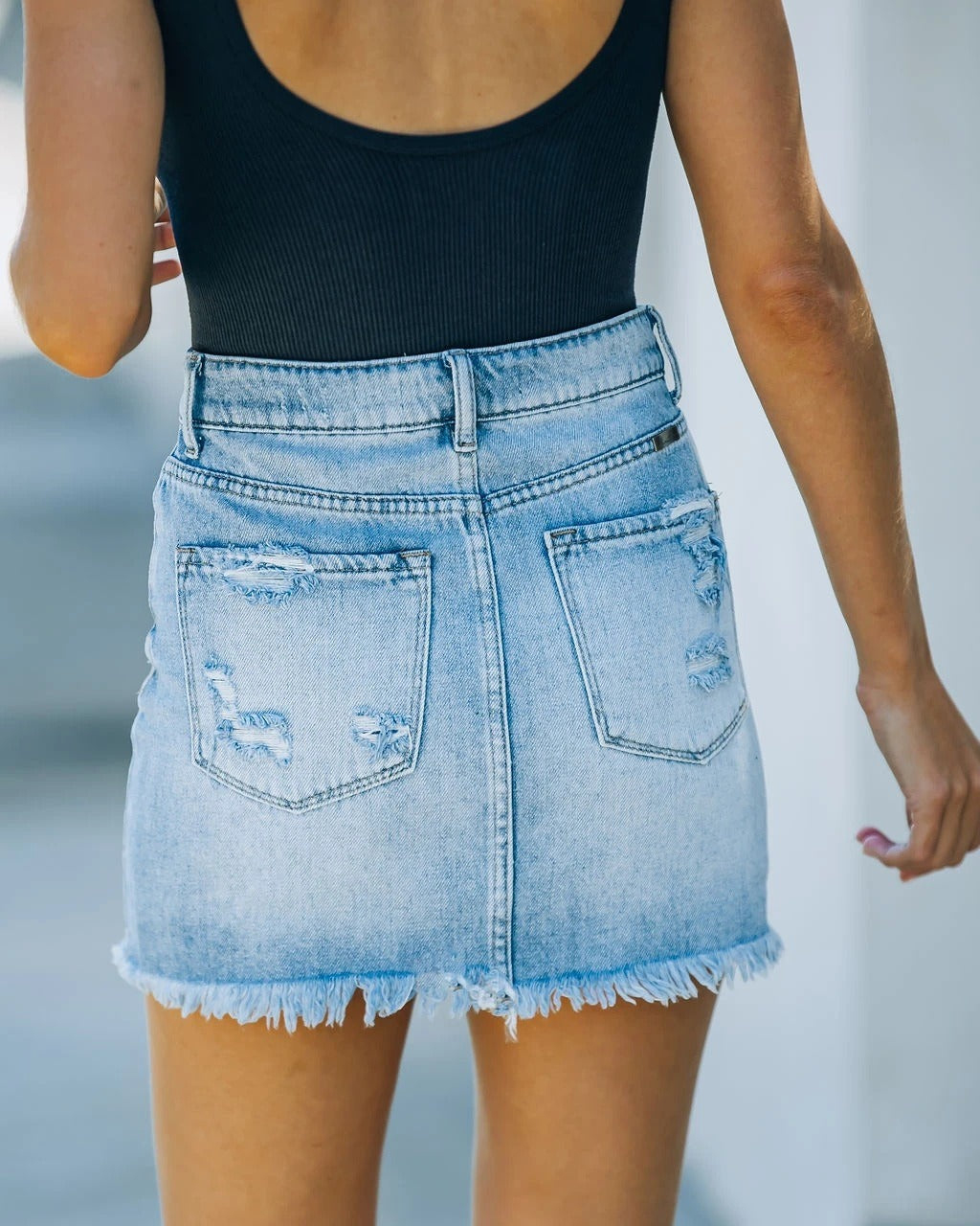 Women's Vintage High-Waisted Mini Denim Skirt with Ripped Edges