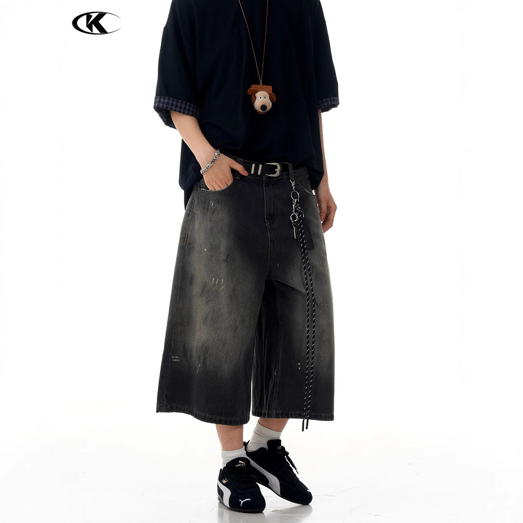 Seven-Quarter Denim Shorts with Faded Ink Splatter -  Wide-Leg Fit