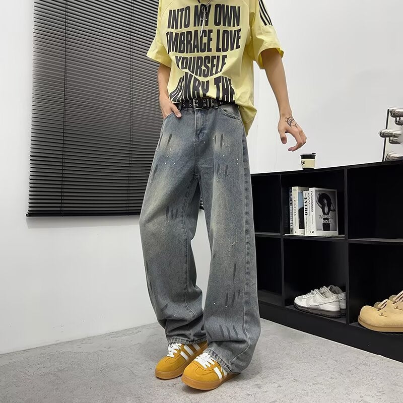 Washed and Distressed Splashed Ink Denim Jeans for Men