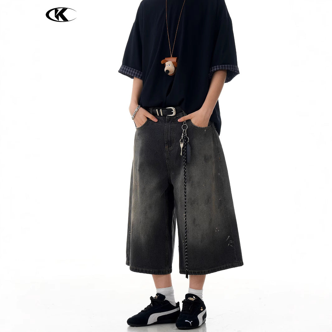 Seven-Quarter Denim Shorts with Faded Ink Splatter -  Wide-Leg Fit